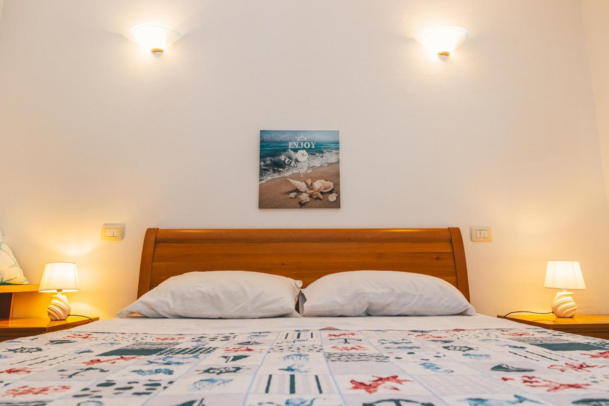 Case Vacanze Il Sogno 2 Porto Pino Bilik gambar